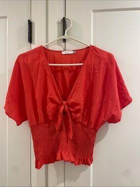 Lush Orange Tie-Front Smocked Crop Top